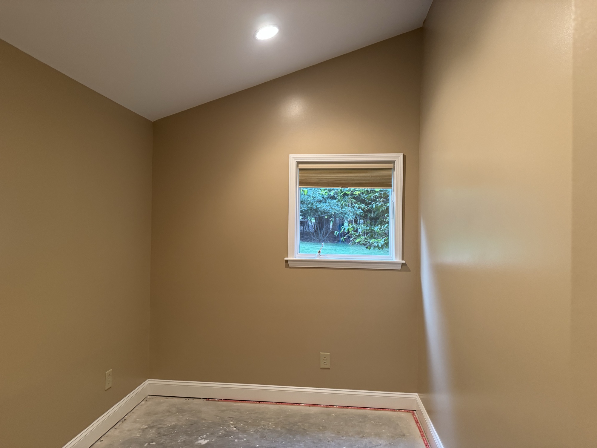 Finished repaired room after drywall, painting, and baseboard work