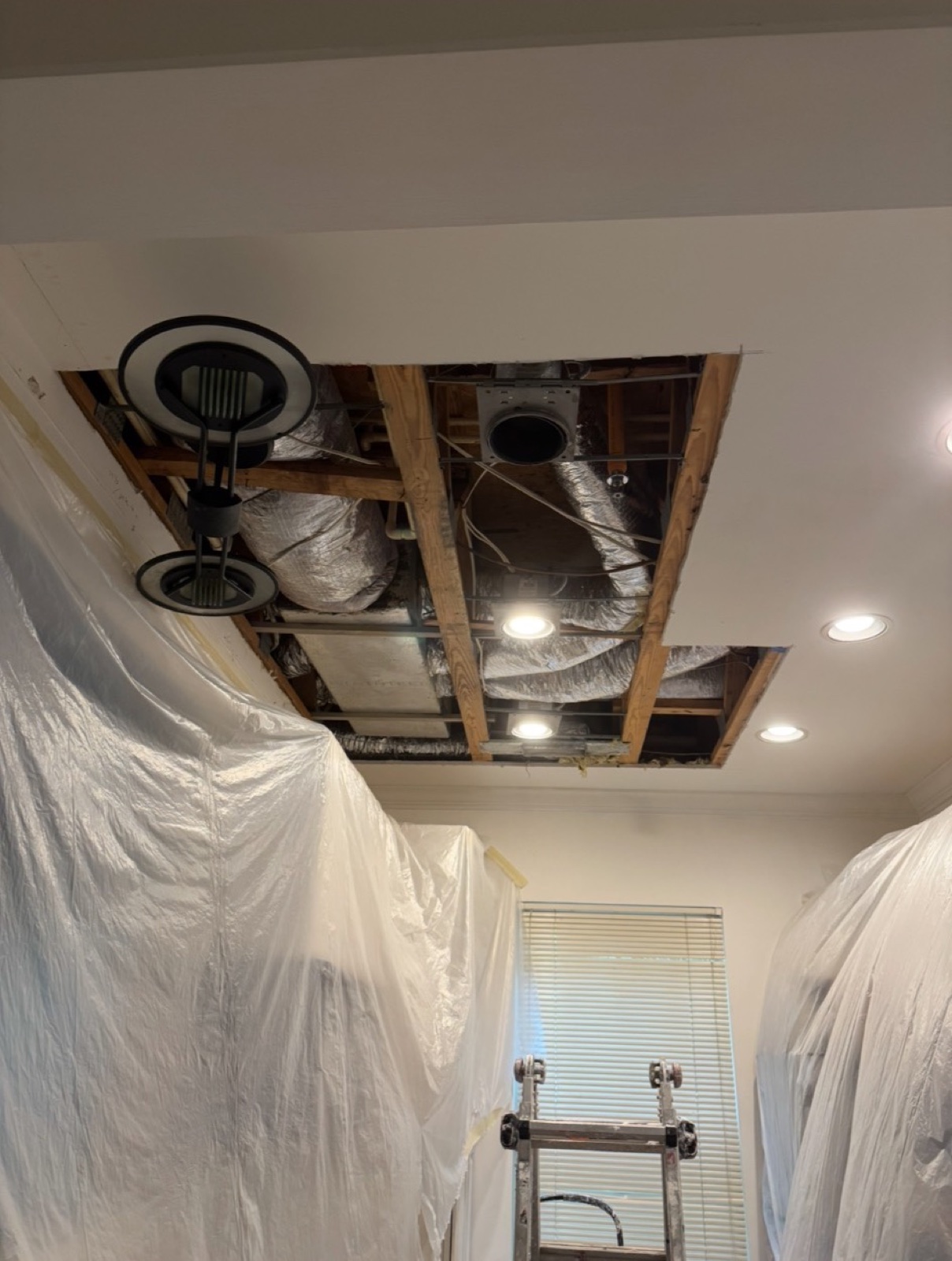 Kitchen ceiling opened during water damage repair
