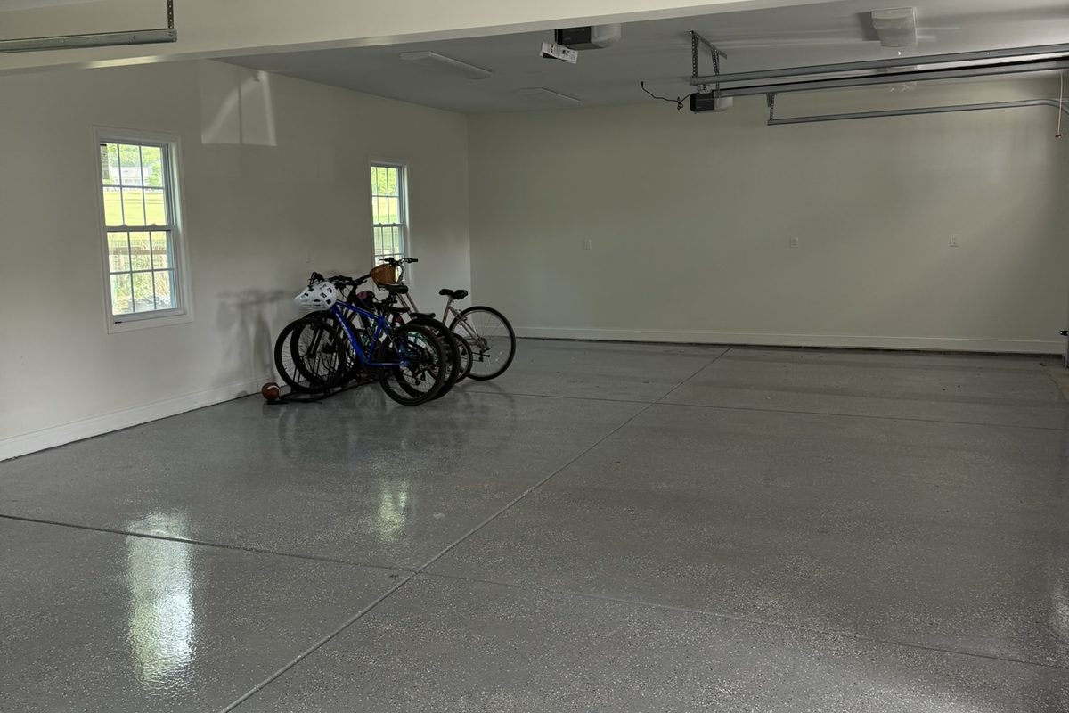 A finished garage in Charlotte with smooth painted walls and ceiling